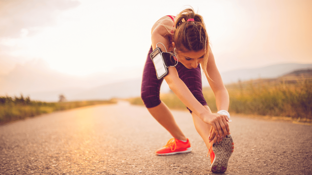 A hypermobile wona stretching her hamstrings