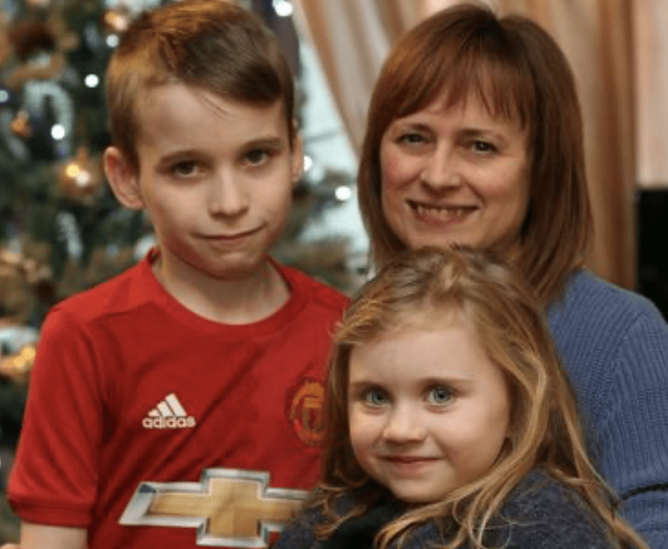 A Fibromyalgia success story: Debs with her grandkids smiling
