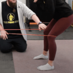 A hypermobility exercise for feet using a band