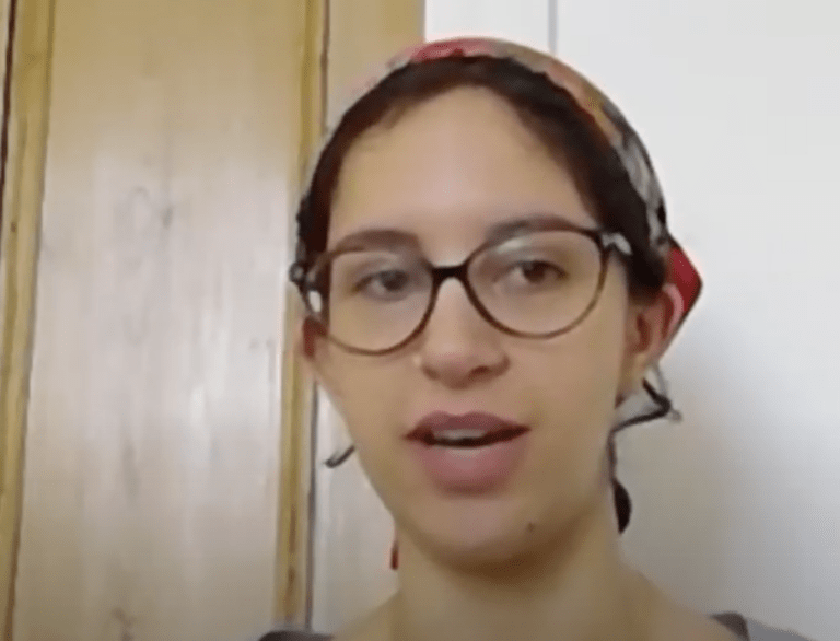 A woman wearing a bandana