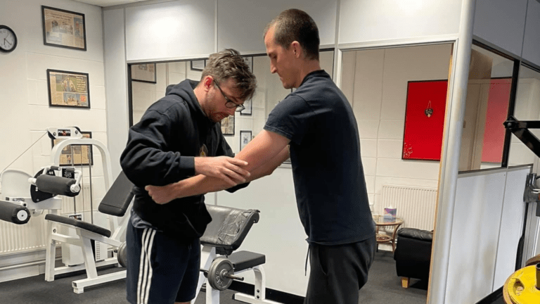A man learning to walk after a stroke