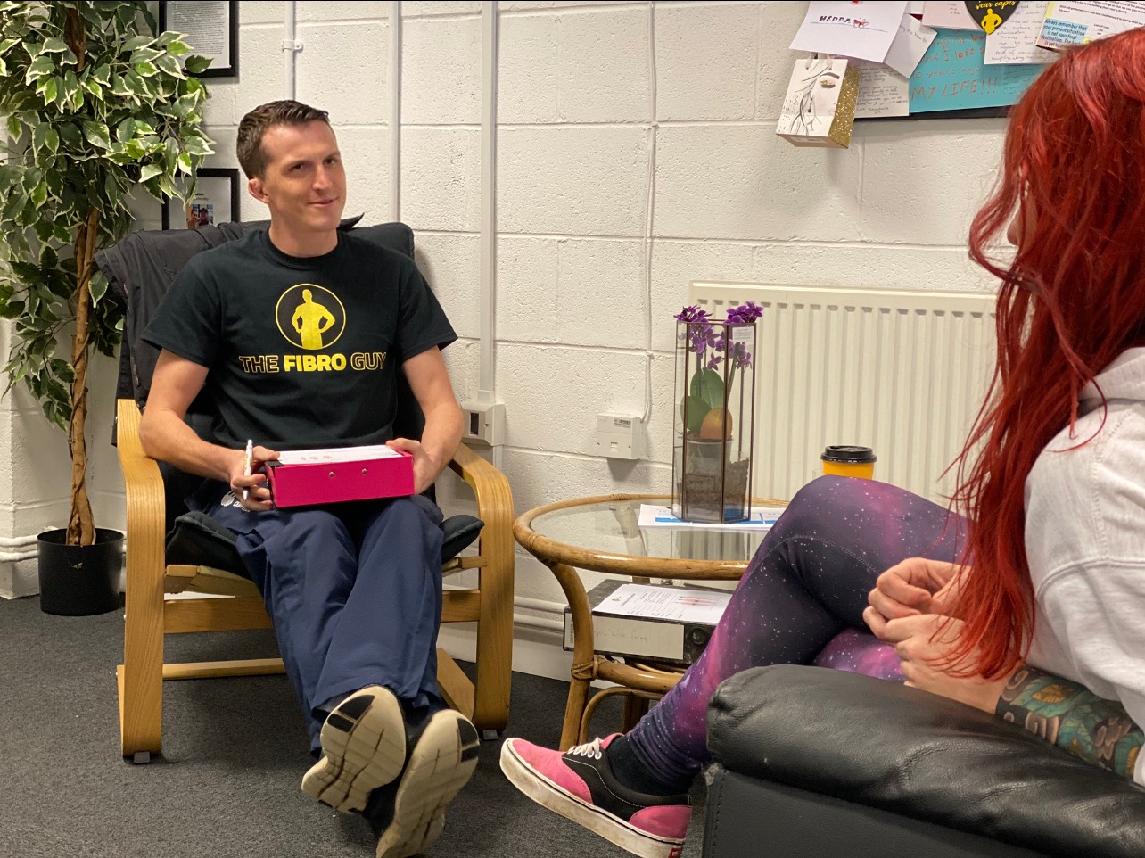 A man and a woman at a consultation