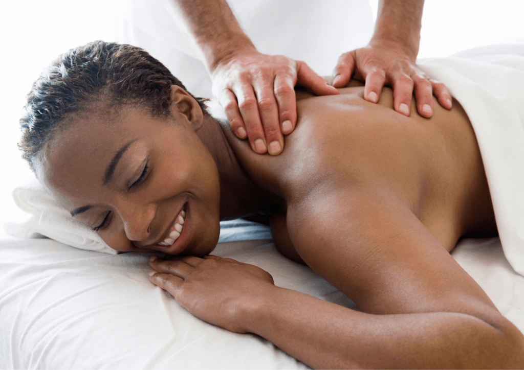 A woman being massaged