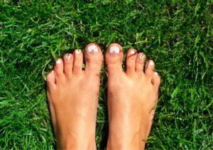 A woman's feet on grass