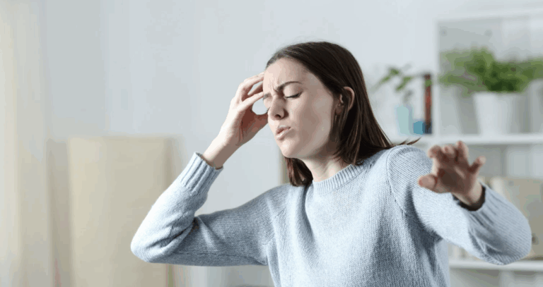 a woman being dizzy