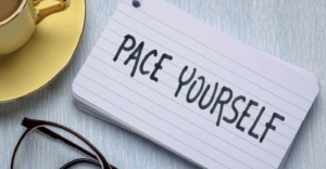 A post it note saying "pace your self"