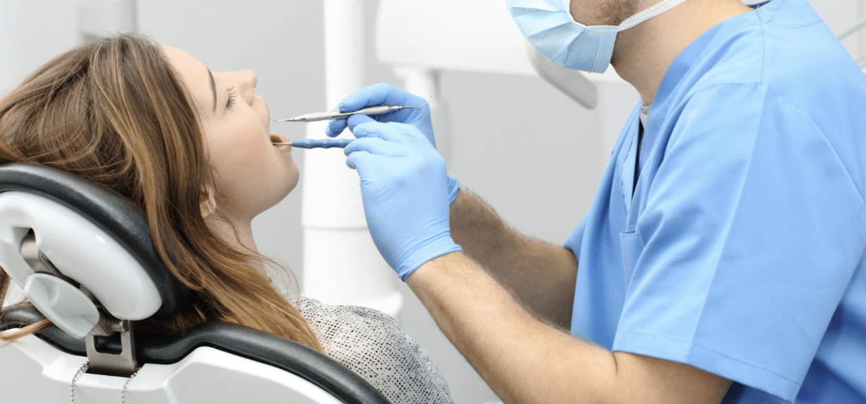 A woman in a dentist chair
